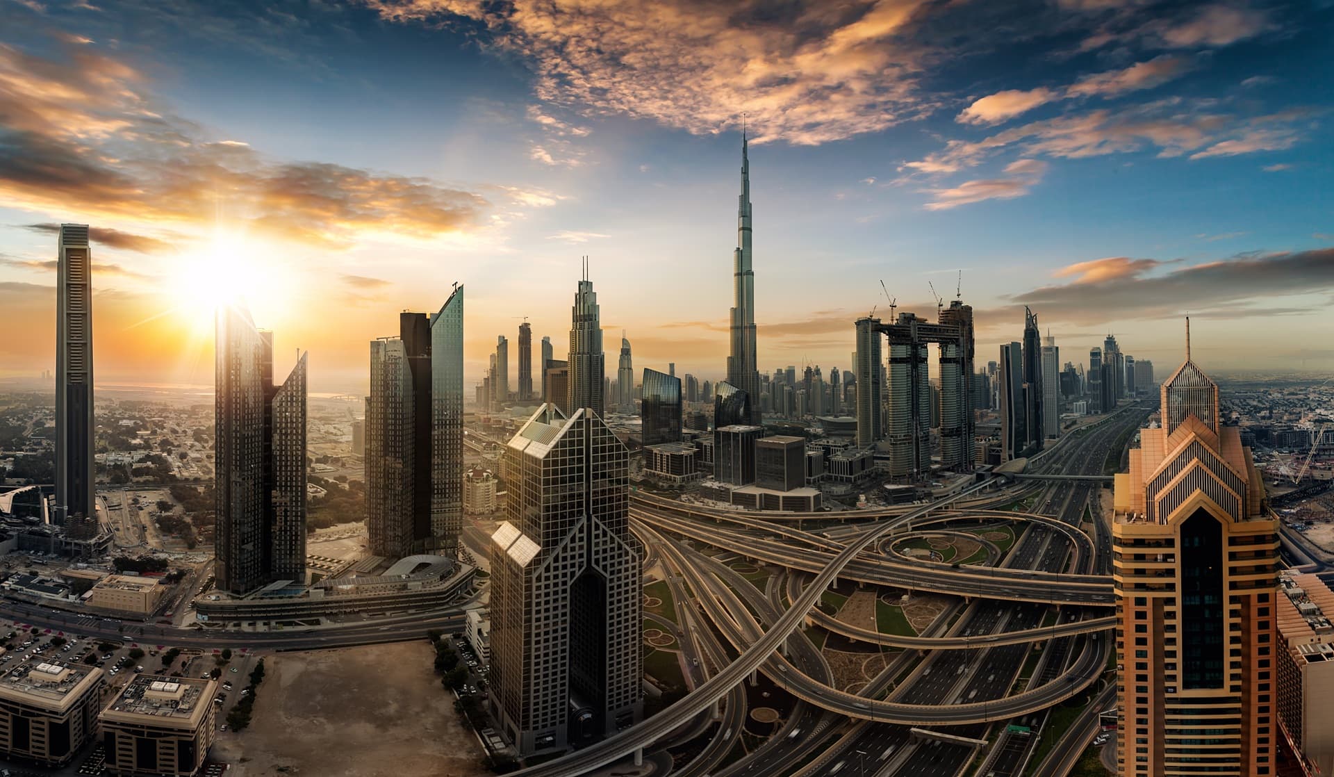 Abu Dhabi futuristic skyline at sunset